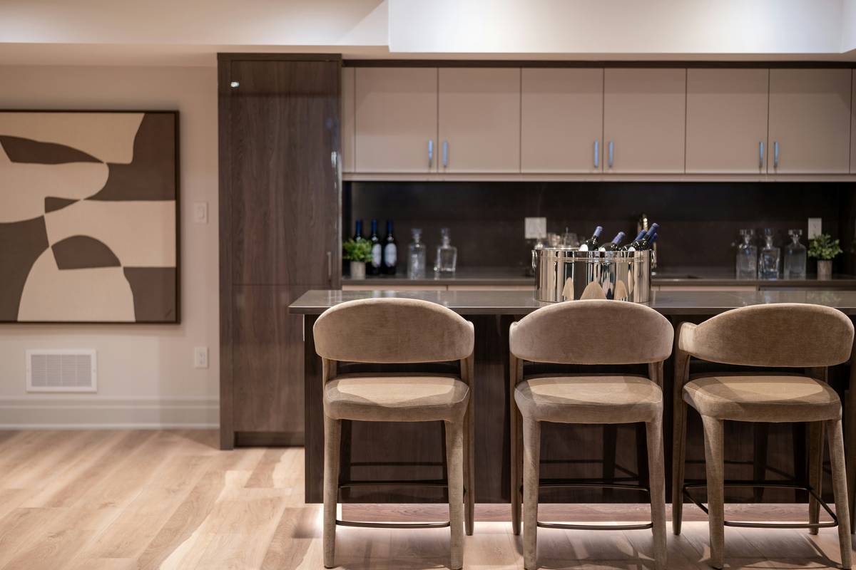 Diagram showing ambient, task, and accent lighting layers in a home bar setup