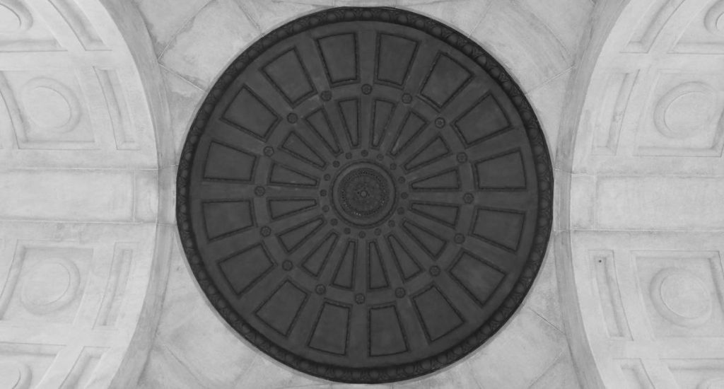 A circular patterned ceiling in a building