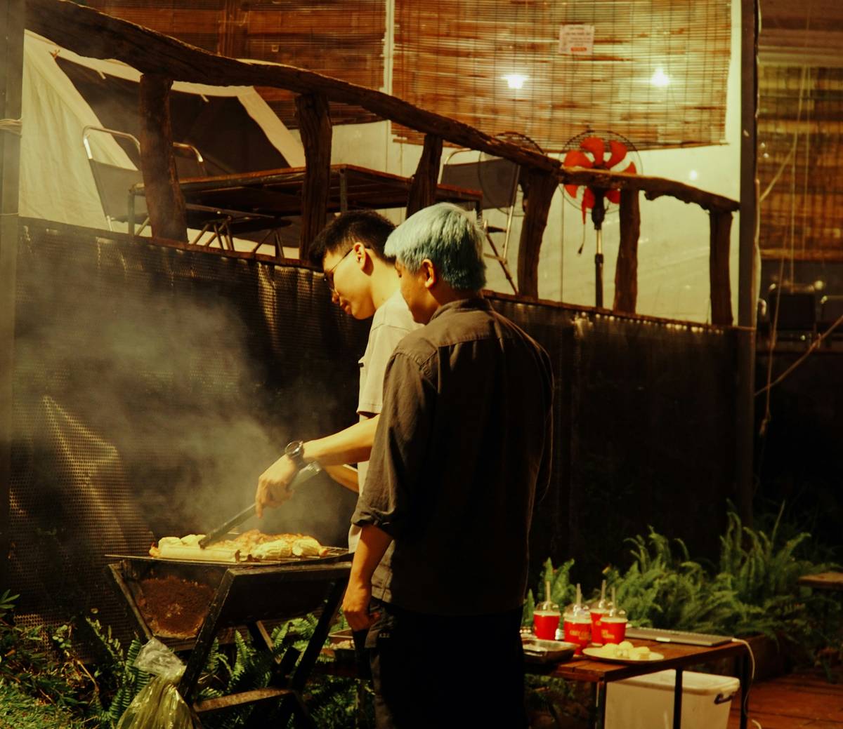 Diagram showing ambient, task, and accent lighting layers in a backyard bar setup