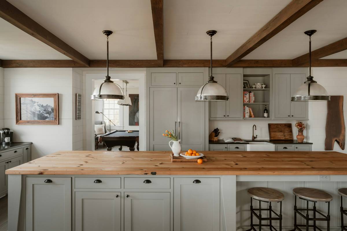 Diagram showing ideal pendant height (30-36 inches above counter) and spacing for 4ft vs 8ft islands