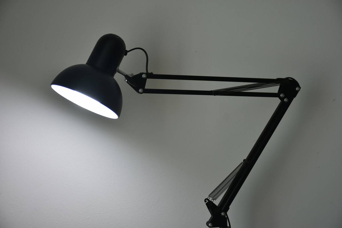 Side-by-side comparison: harsh white under-cabinet lighting vs. warm dimmable light bar in a home bar setting