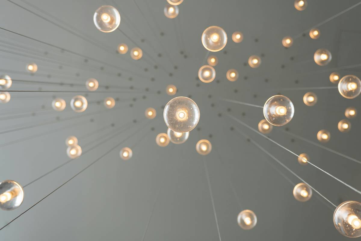 restaurant bar lighting ideas with layered ambient zones in a modern lounge